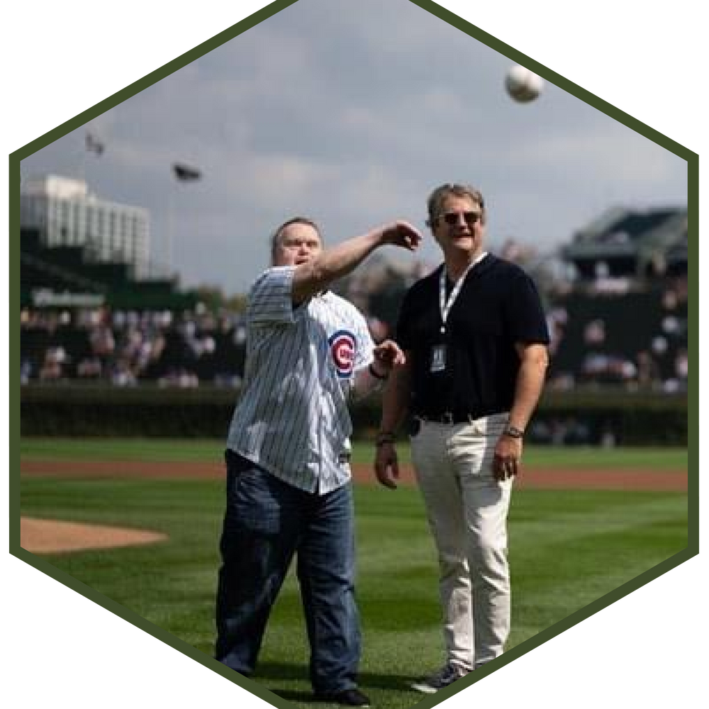 Picture of Scott Mead throwing the first pitch at a Chicago Cubs game. 