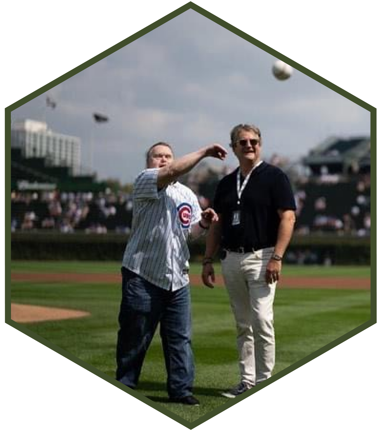 Picture of Scott Mead throwing the first pitch at a Chicago Cubs game. 